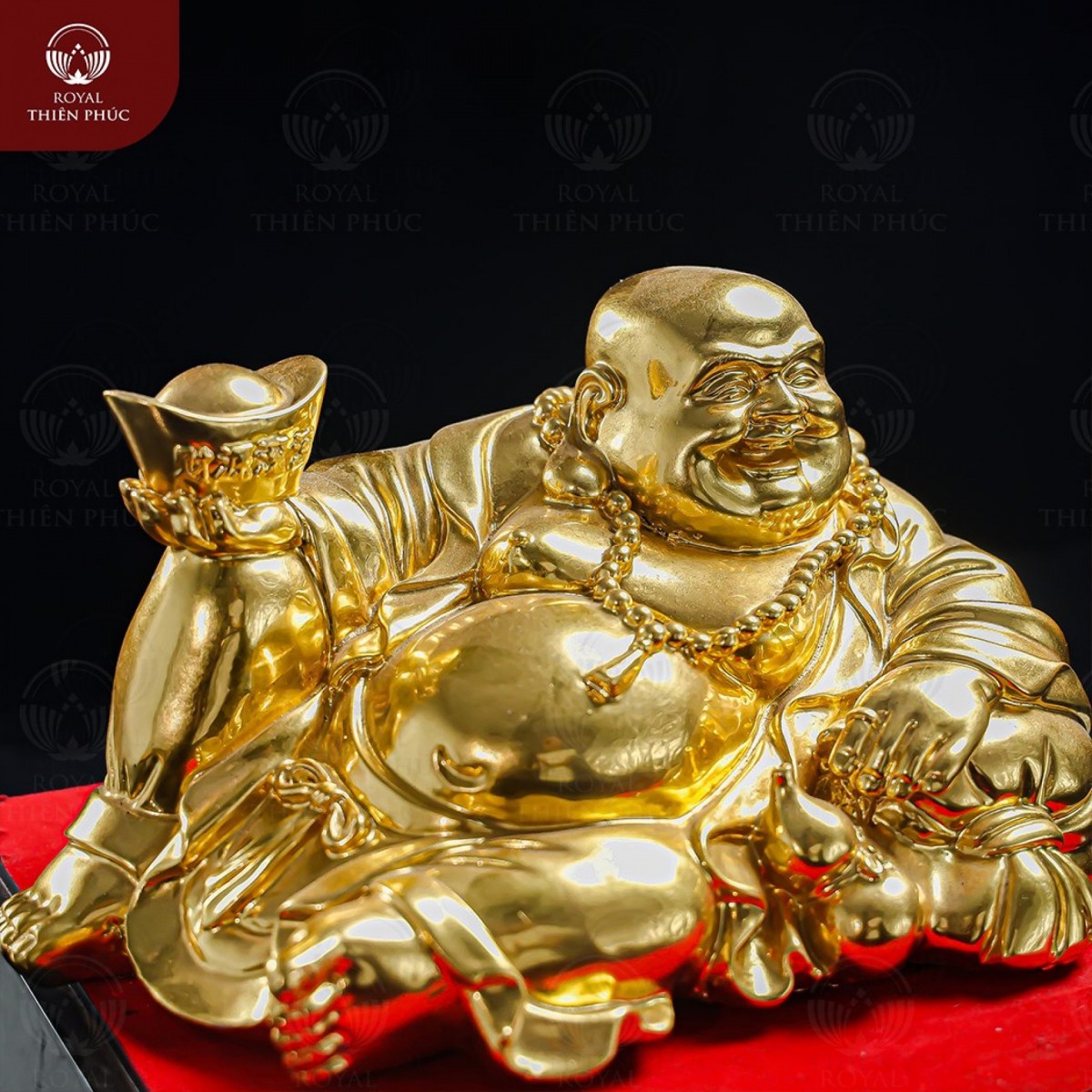 Giá trị phong thủy của tượng Phật Di Lặc cầm thỏi vàng Giá trị phong thủy của tượng Phật Di Lặc cầm thỏi vàng